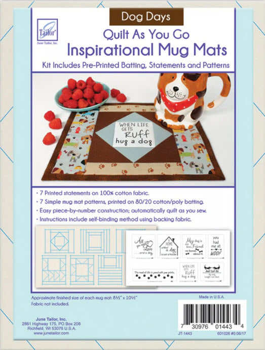 Front cover of a quilting kit package titled "Dog Days Quilt As You Go Inspirational Mut Mats" by June Tailor, showing the product kit contents and included printed batting, statements, and mug mat patterns. The cover includes a photo of a quilted dog mug mat with a dog illustration and a mug with a dog design, plus small sample pattern previews and a barcode at the bottom.