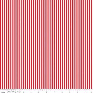 Red and white vertical striped fabric pattern shown flat, with a small ruler scale along the bottom edge.