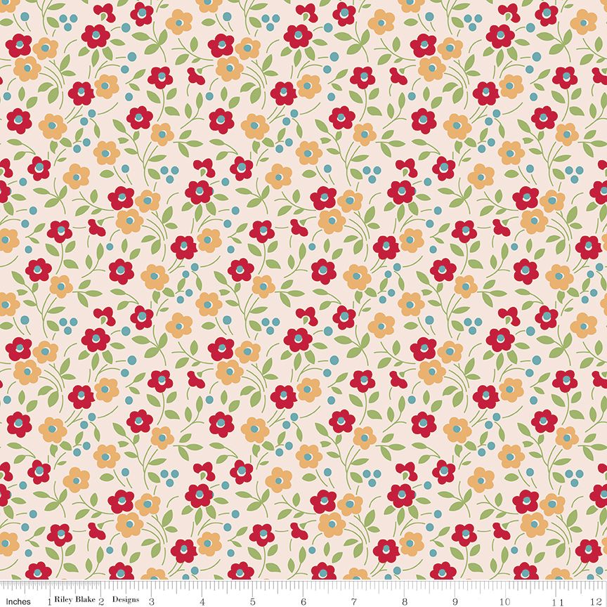 A repeating floral pattern on a cream background with red, orange, and blue flowers, green leaves, and stems. A ruler along the bottom edge shows scale and includes the text Riley Blake Designs.