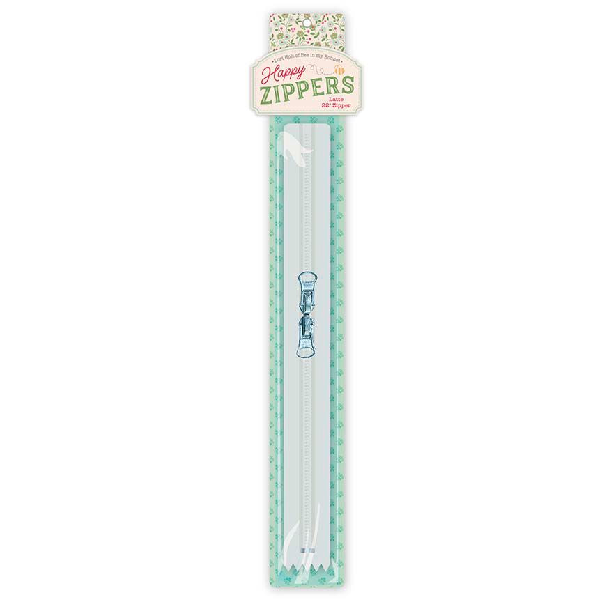 A single-pack of a white zipper with glossy white zipper pulls in a mint green patterned plastic sleeve with a decorative header card that reads 'Happy Zippers'.