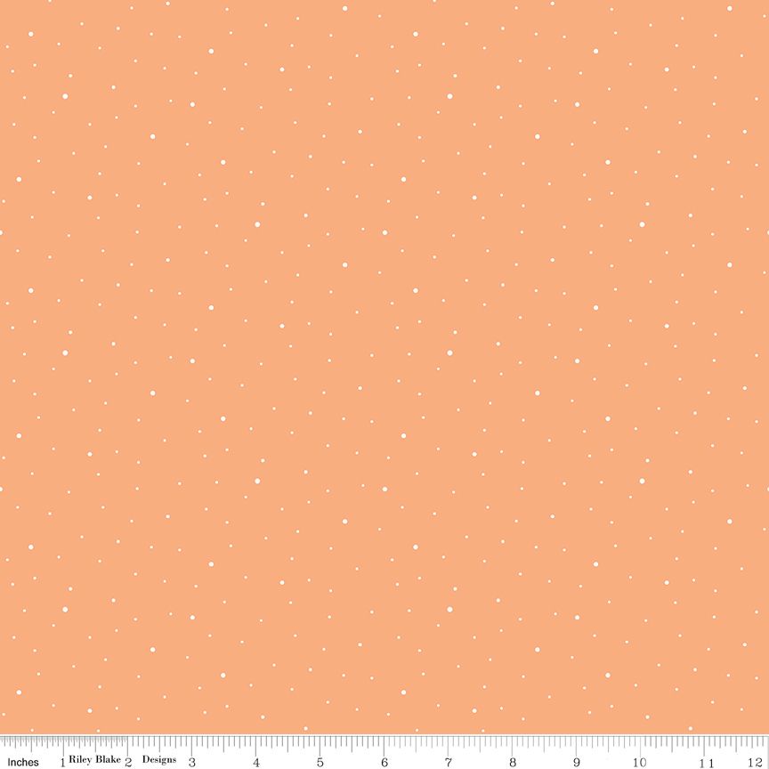 Marmalade and white dots pattern fabric swatch