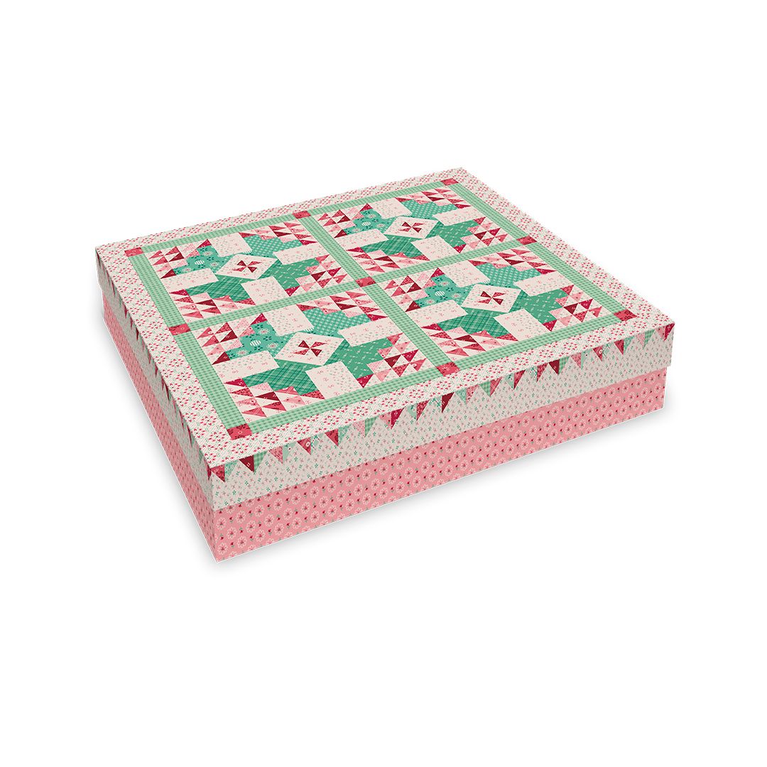 Fabric-covered box with a quilt pattern on a white background