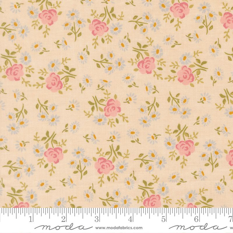 Floral pattern fabric with pink roses and green leaves on a cream background, featuring Moda label.