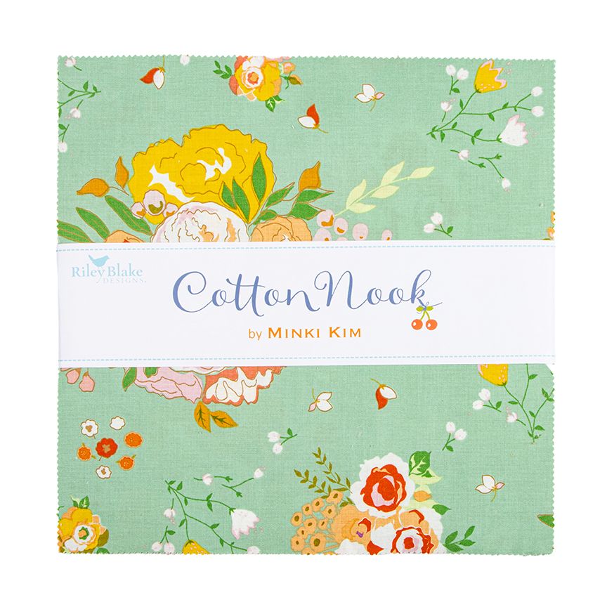 A 10-Inch stacker with a mint green floral pattern, featuring a white paper label across the middle that reads 'CottonNook by MINKI KIM' and shows the Riley Blake Fabrics logo.