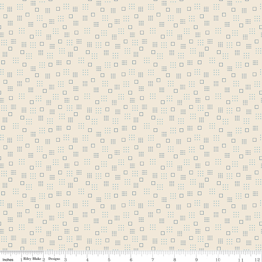 Blue fabric with geometric square designs.