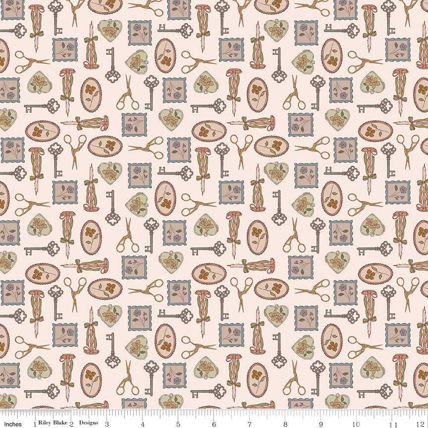 Tan fabric with framed flowers, keys, candles and scissors.