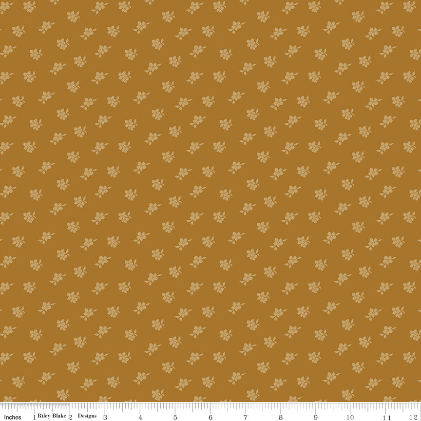 Brown fabric with scattered blossoms.