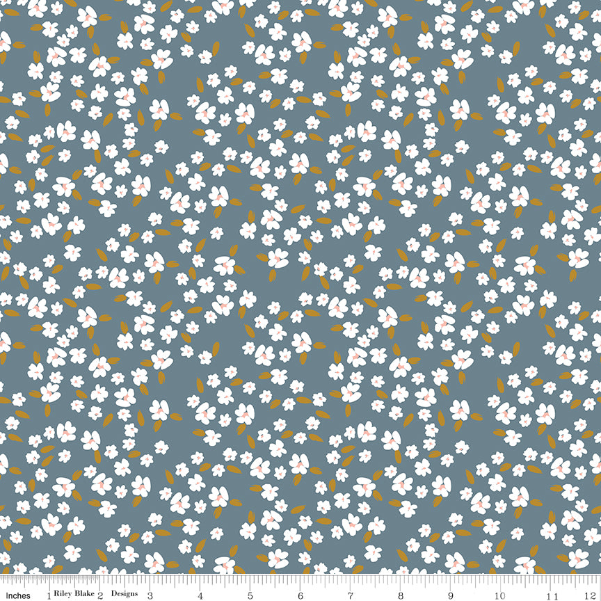 Blue fabric with white blossoms.