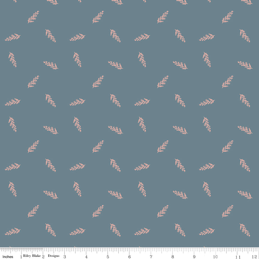 Blue fabric with scattered leaves.