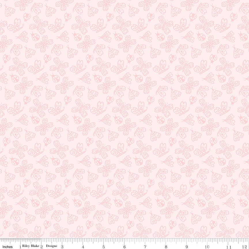Pink fabric with outlined butterflies, moths and ladybugs.