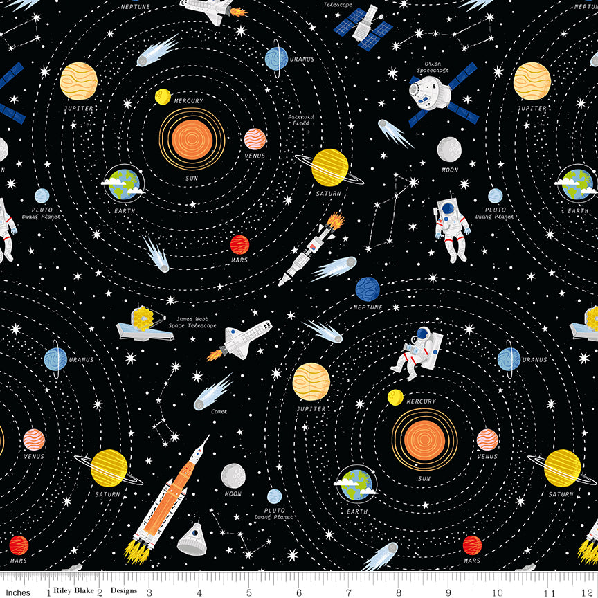 Black glow in the dark fabric with planets, stars, astronauts and rockets, with a ruler along the bottom edge.