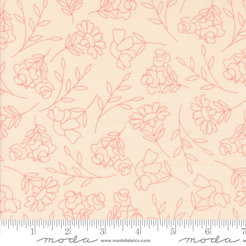 A close-up of a fabric pattern featuring coral-pink floral line drawings on a pale pink background, with a ruler and Modas Fabrics branding along the bottom edge.