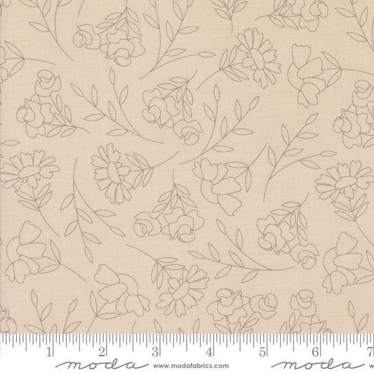 Beige fabric with a delicate grey floral line pattern, shown flat with a measuring ruler at the bottom indicating the 12-inch repeat.