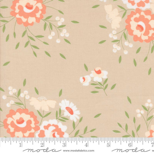 A fabric pattern swatch featuring a beige background with a retro floral print of coral, white, and cream flowers with green leaves. A white ruler at the bottom shows the scale of the pattern.