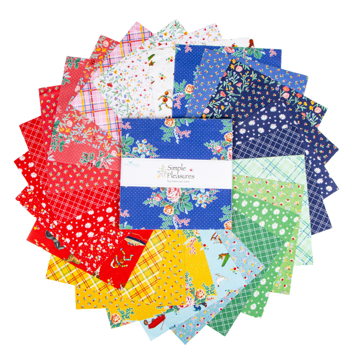 A circular arrangement of colorful patterned fabric squares with a white paper band reading 'Simple Pleasures' in the center, photographed on a plain white background.
