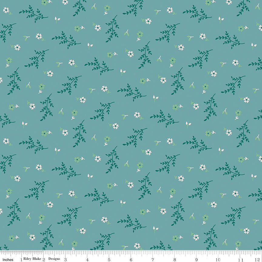A repeating fabric pattern on a muted teal background featuring small white flowers, green leaves, and delicate butterfly motifs, with a ruler strip along the bottom edge showing scale.