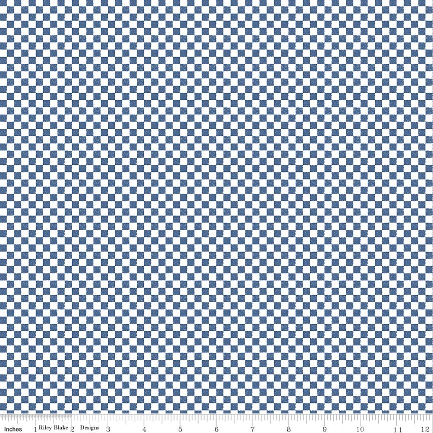 Fabric with a white and denim checkered pattern and ruler at the bottom