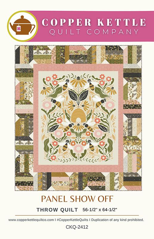 Promotional graphic for the Copper Kettle Quilt Company's 'Panel Show Off' throw quilt. The design features a central floral and bird motif in soft pastel tones, framed by a pink border and surrounded by a patchwork border of various patterned quilted squares.