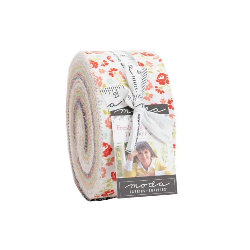 Roll of fabric with floral pattern and Moda label on a white background