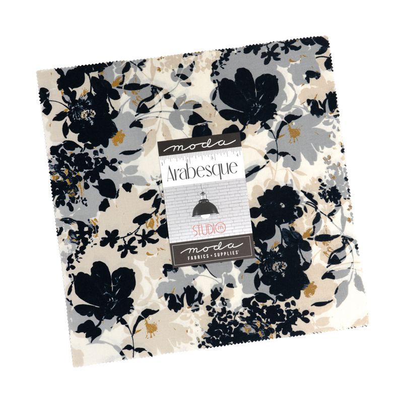Floral patterned fabric with Moda label on a white background