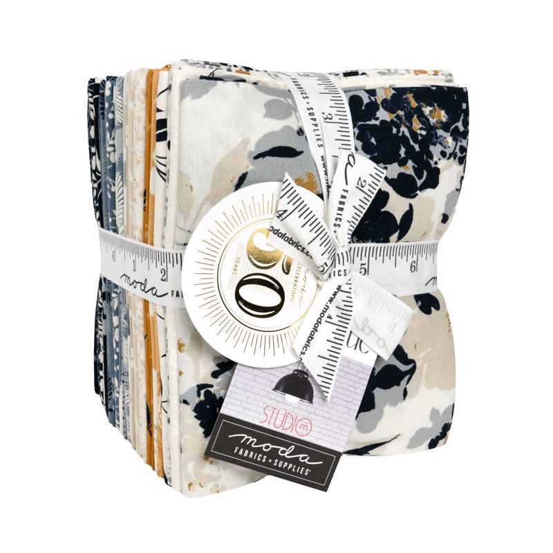 Fat quarter bundle with a ruler and 'Studio' label on a white background