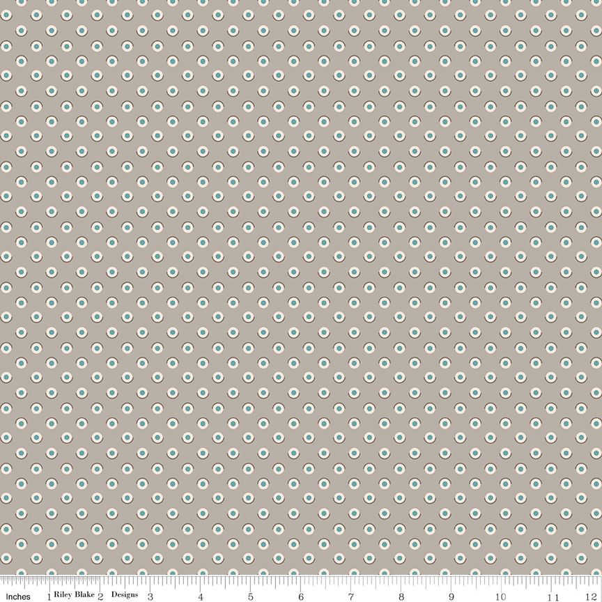 Fabric swatch featuring white circles with a turquoise center on a light gray background