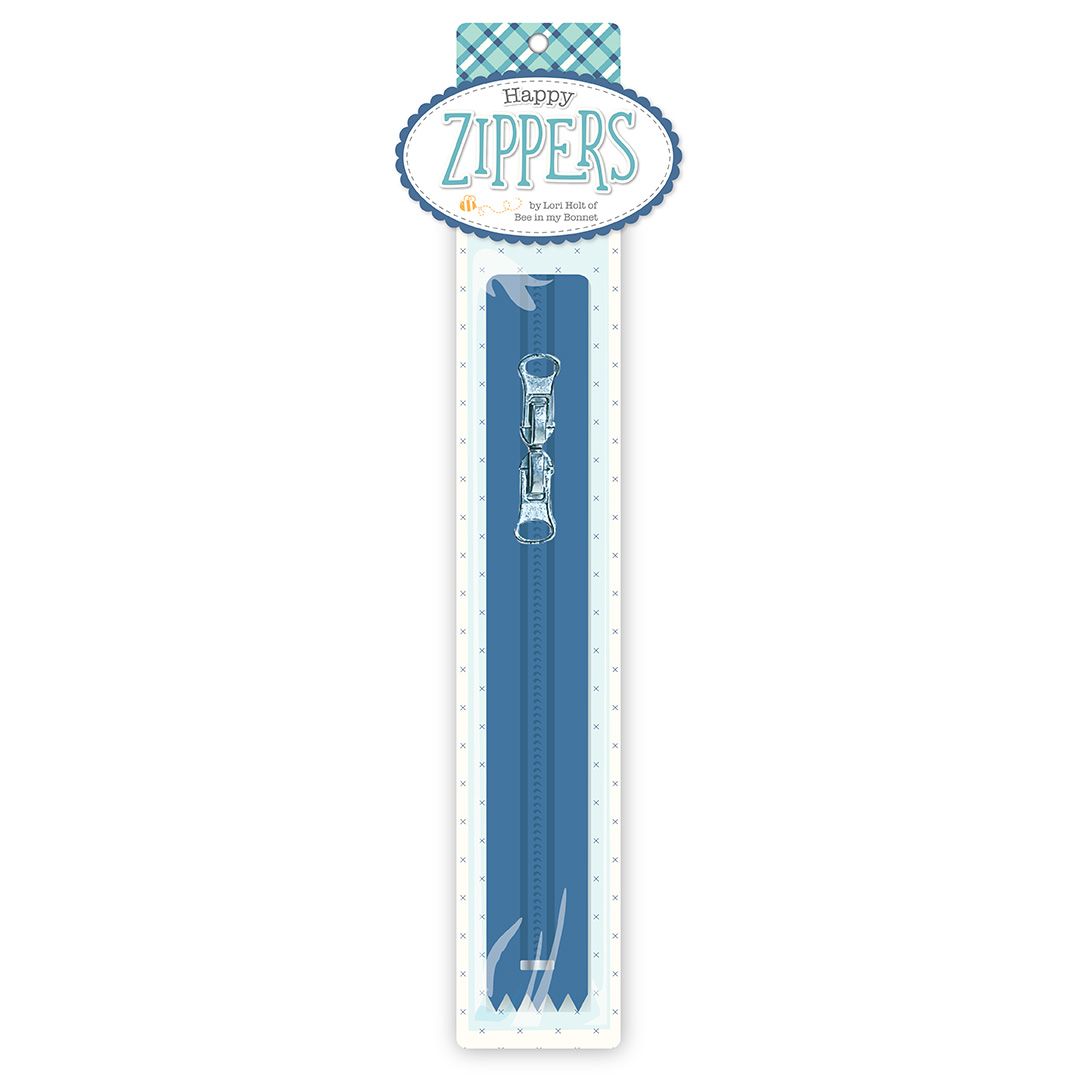 A single blue zipper with a decorative silver pull tab, packaged in a tall white card with blue polka dots and a header that reads 'Happy Zippers'.