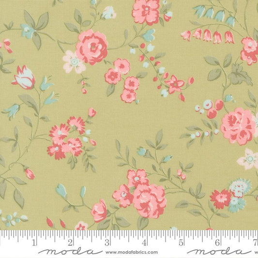Floral fabric pattern with pink and blue flowers on a light green background, featuring Moda label.