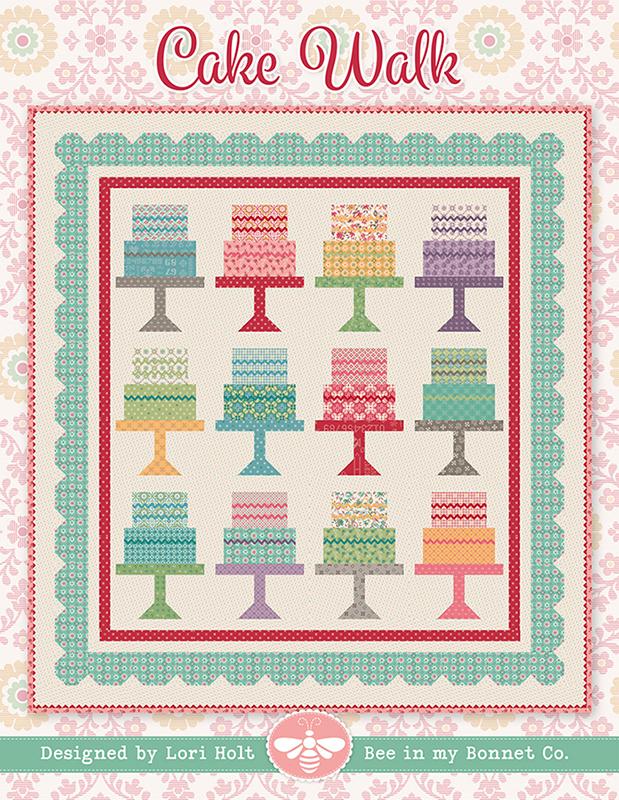A quilt pattern cover titled 'Cake Walk' showing a patchwork design of colorful illustrated cakes on stands, with decorative pink and teal borders and text at the bottom reading 'Designed by Lori Holt' and 'Bee in my Bonnet Co.'.