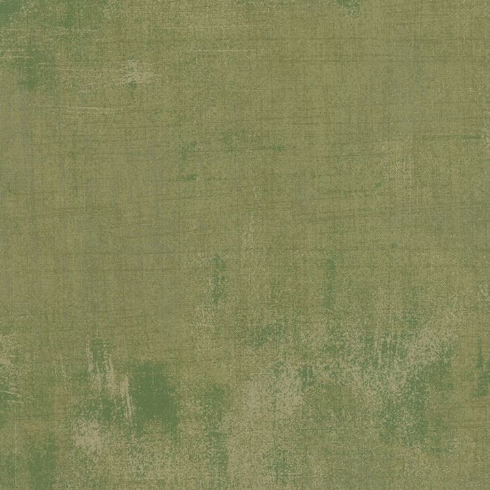 Textured green fabric pattern