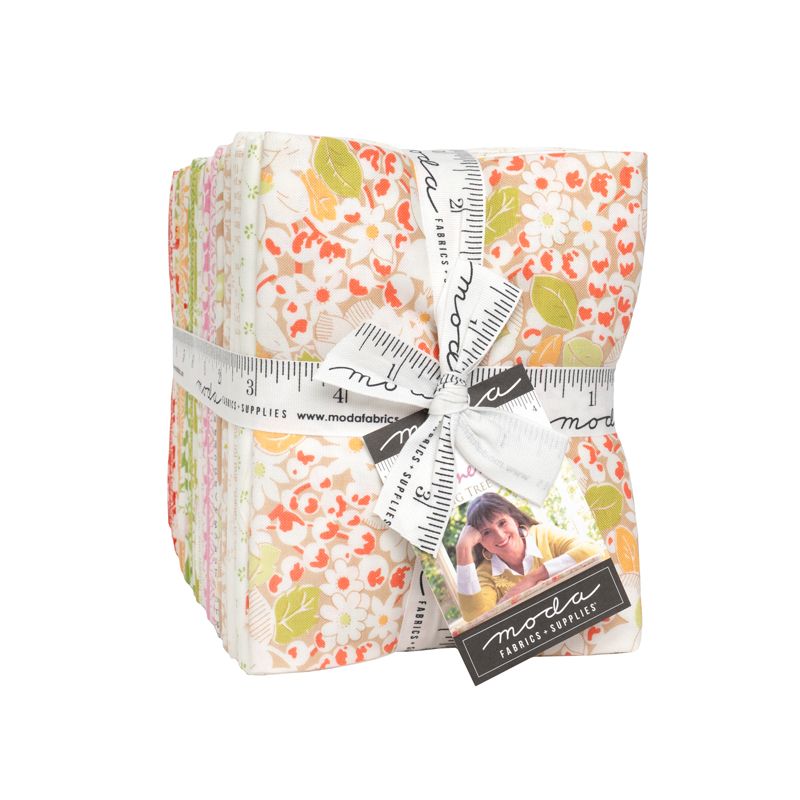 Pack of floral fabric strips with a ruler and Moda label on a white background