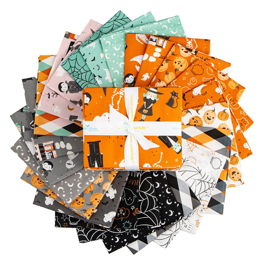 Collection of Halloween-themed fabric squares in various patterns.