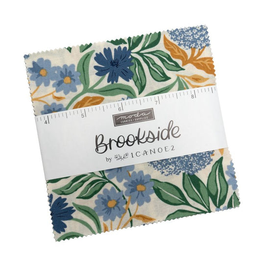 Charm pack with floral pattern and 'Brookside' label on a white background