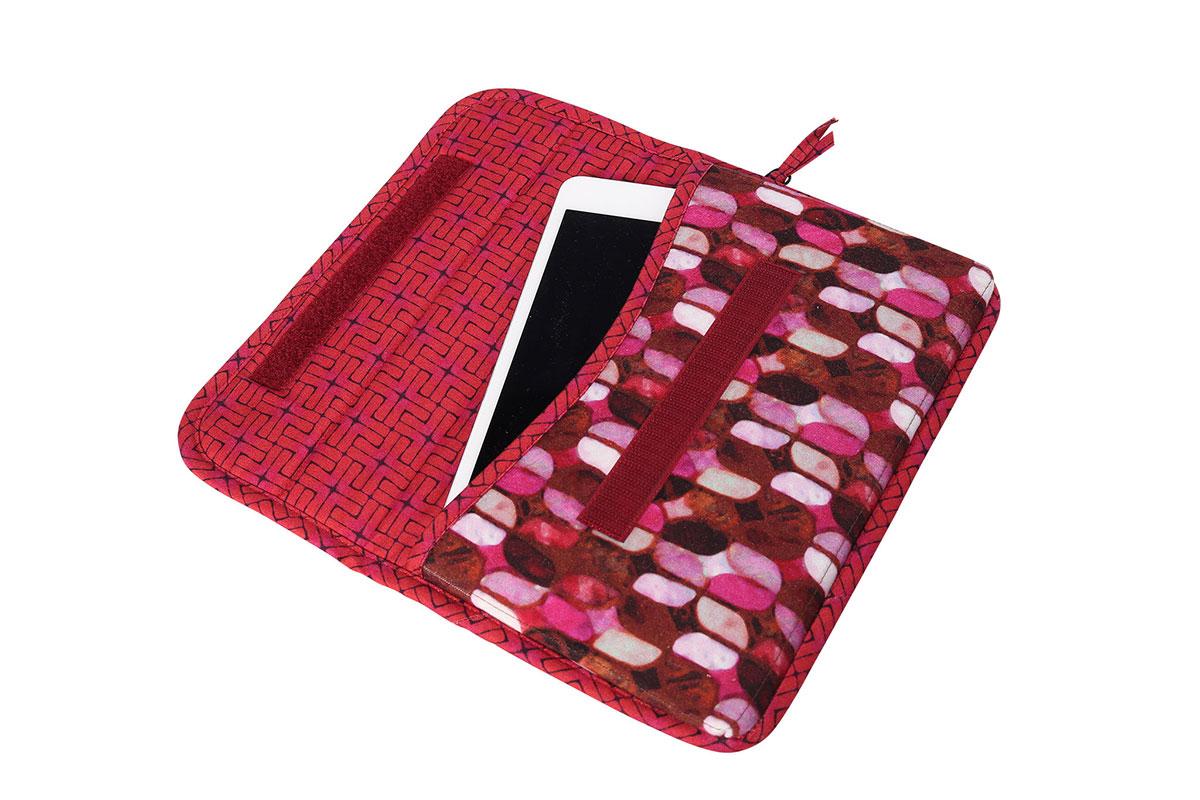 Red patterned case with a white screen device inside on a white background