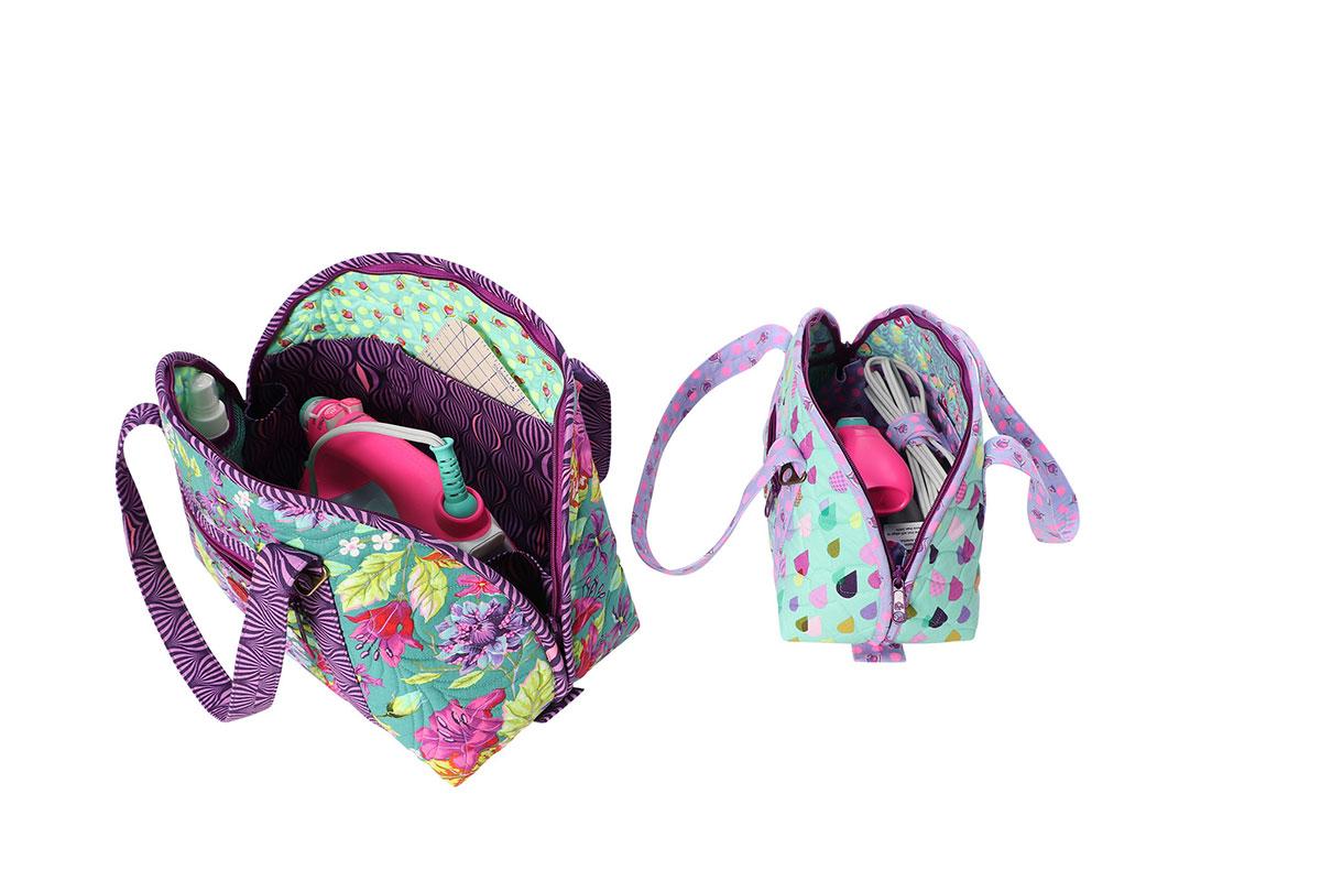 Floral-patterned bag with a pink item inside on a white background