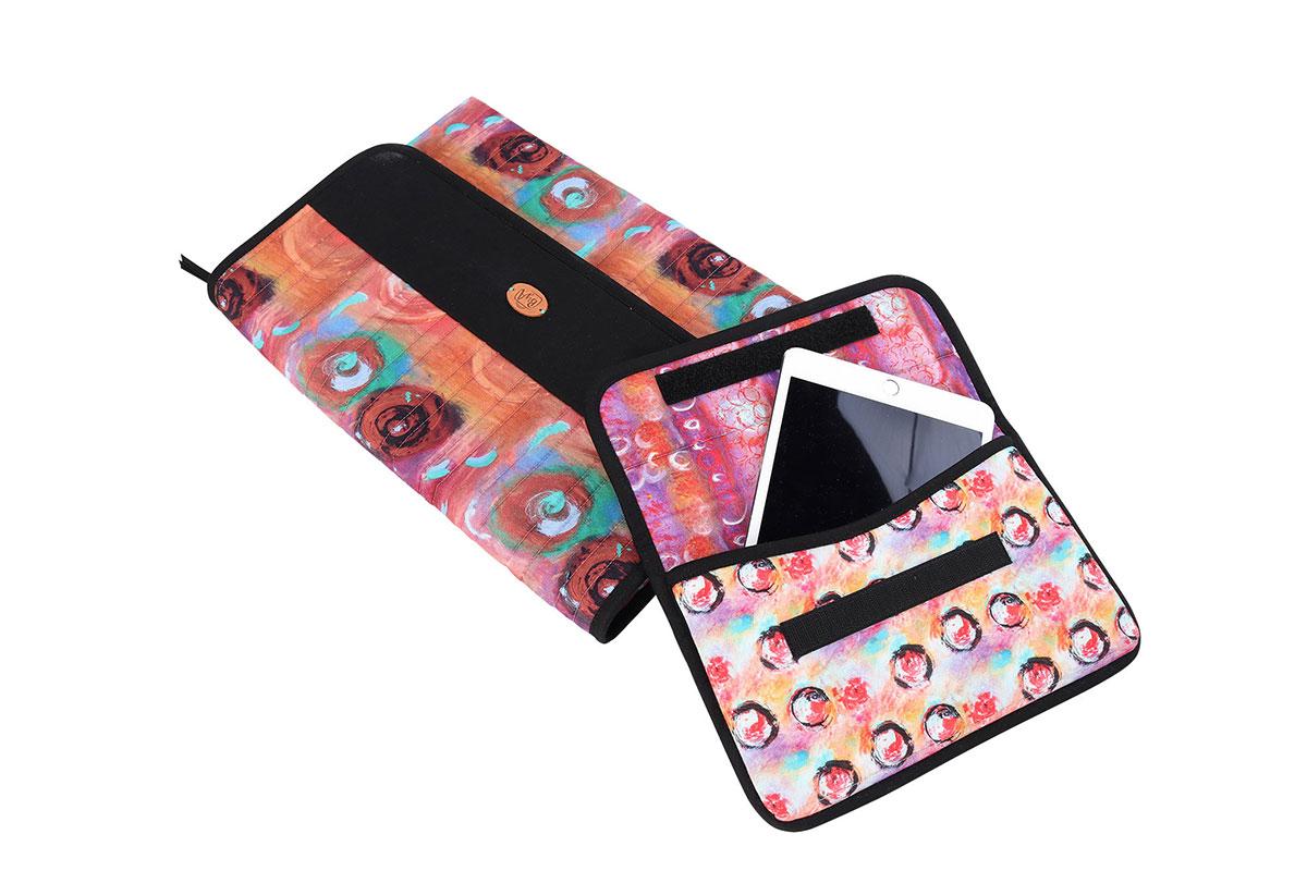 Colorful case with a swirled pattern and a tablet inside on a white background