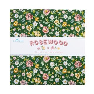 A fabric layer cake wrapped in a white paper band labeled 'rosewood' with a green floral pattern, photographed on a plain white background.