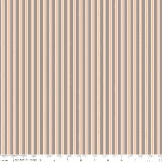 Vertical striped fabric pattern in warm beige, tan, and pewter tones with a white ruler scale along the bottom edge.