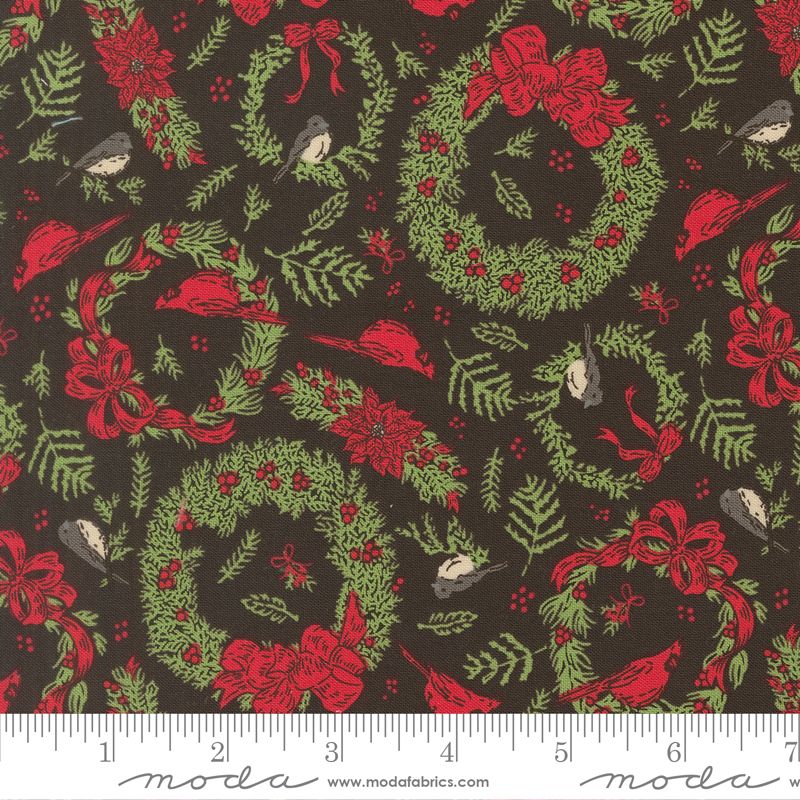 Christmas-themed fabric pattern with wreaths, bows, and birds on a dark background, featuring Moda label.