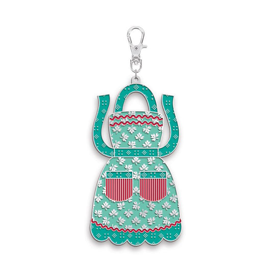 A turquoise and white floral apron-shaped keychain or bag charm with red striped pockets and a silver lobster clasp, shown on a plain white background.