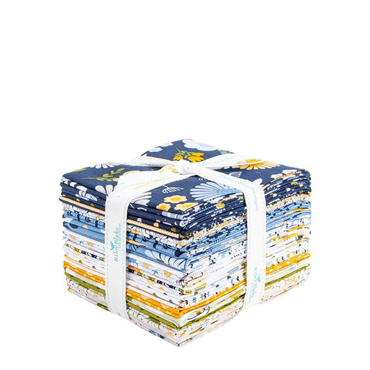 A fat quarter bundle tied with a white band, shown on a plain white background. The fabrics feature navy, blue, white, yellow, and green floral and botanical designs.
