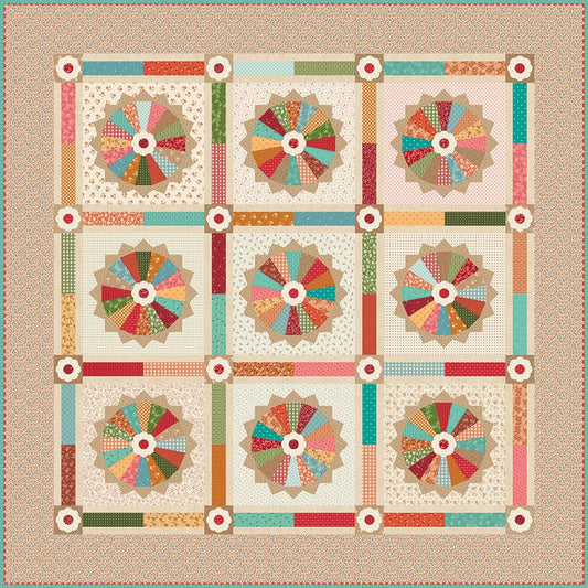 A quilted patchwork design featuring nine circular floral or pinwheel-style blocks the look like pies arranged in a 3x3 grid, surrounded by a patterned border. The design uses many colors including red, green, blue, orange, pink, and beige in various fabric patterns, making 'Multicolor' the most appropriate choice for product colors.