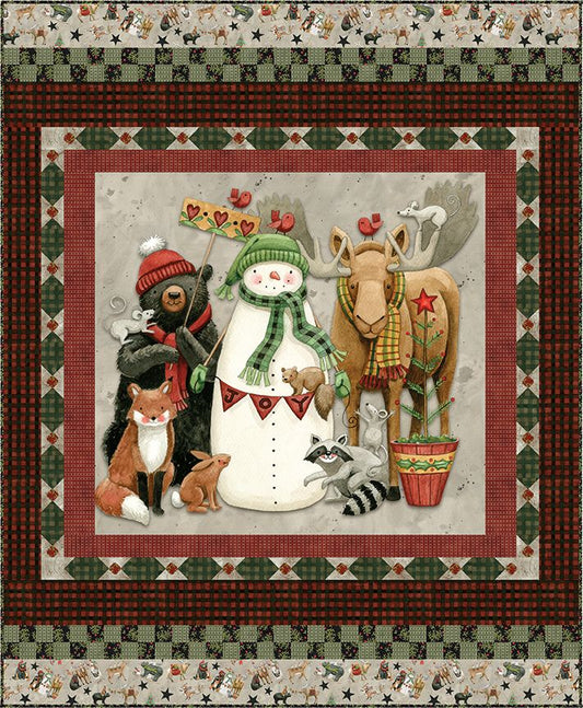 Quilt with winter-themed animals including a bear, fox, and moose, framed by decorative borders.