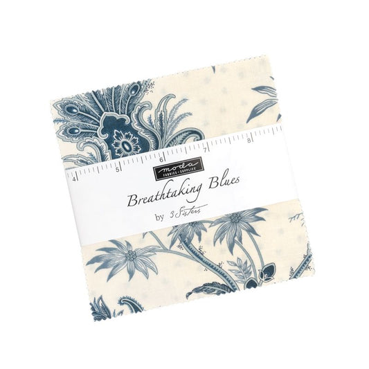 Charm pack with blue floral pattern on a white background