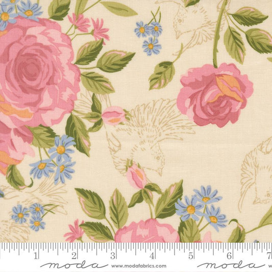 Floral fabric pattern with pink roses and blue flowers on a cream background, featuring a Moda label.