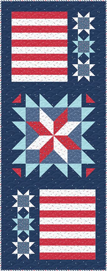 A patriotic quilted table runner featuring red and white stripes, white stars on a blue field, and a central starburst motif in navy, light blue, white, and red.