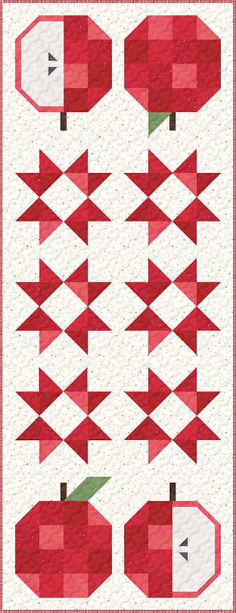 Quilted table runner with red apple and star designs on a white background
