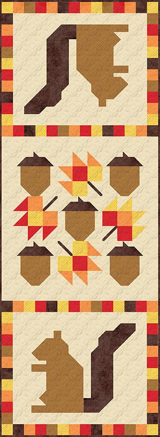 A quilted table runner featuring autumn motifs, including a brown squirrel, acorns, and colorful fall leaves on a cream background with a red, orange, and yellow checkered border.