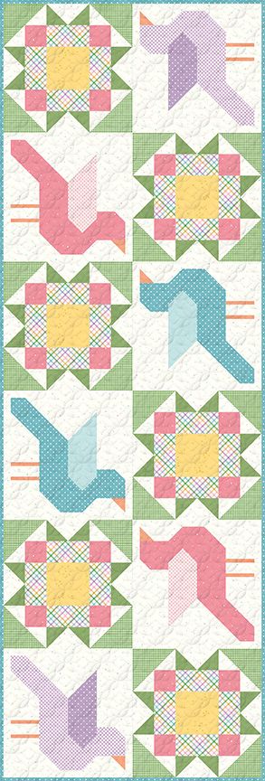 A quilted table runner featuring a repeating pattern of stylized birds and geometric starburst blocks in pastel pink, light blue, lavender, green, and yellow on an off-white background.