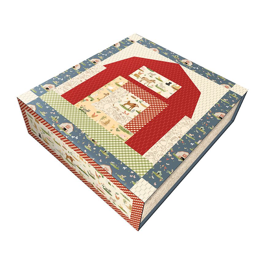 A square quilted fabric storage box with a rustic barn design, featuring a red barn roof, green and cream checkered details, and a blue border with small animal motifs, shown on a plain white background.